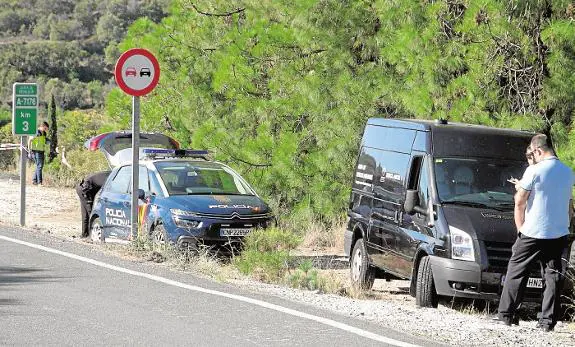 Police at the spot where the body was found.