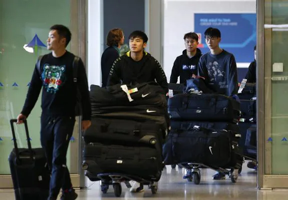 The Wuhan Zall players as they arrived at Malaga Airport on Wednesday.