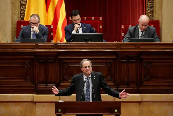 Torra speaks in the Catalan parliament this week.