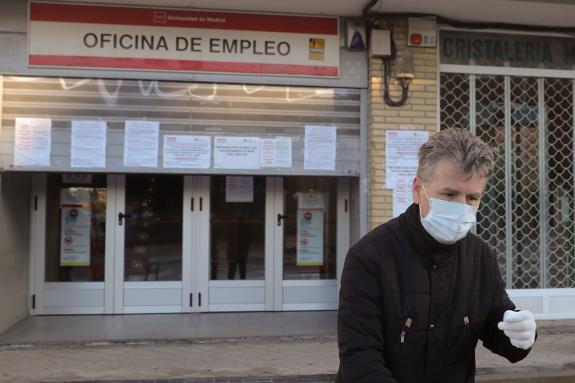 A man outside a job centre in Madrid earlier this month.