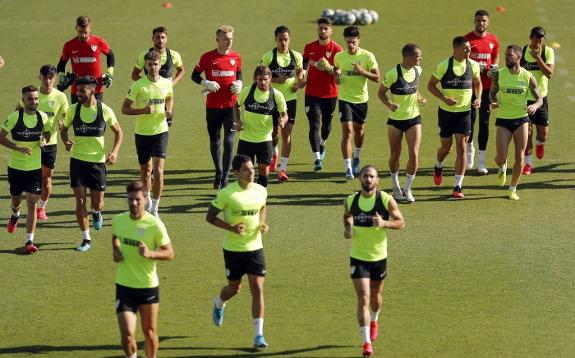 The Malaga squad takes part in a joint jogging session at the Annex this week. 