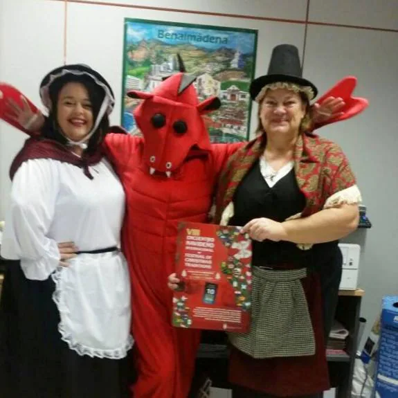 Cath John with Dewi the Dragon and secretary Debbie Benham.