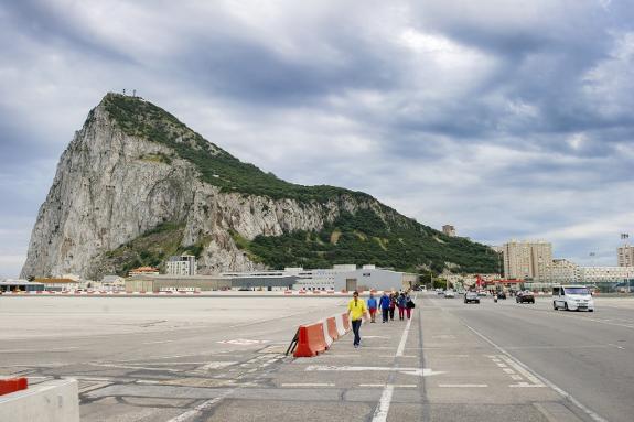 Many people live in Spain but cross the border to work in Gibraltar each day.