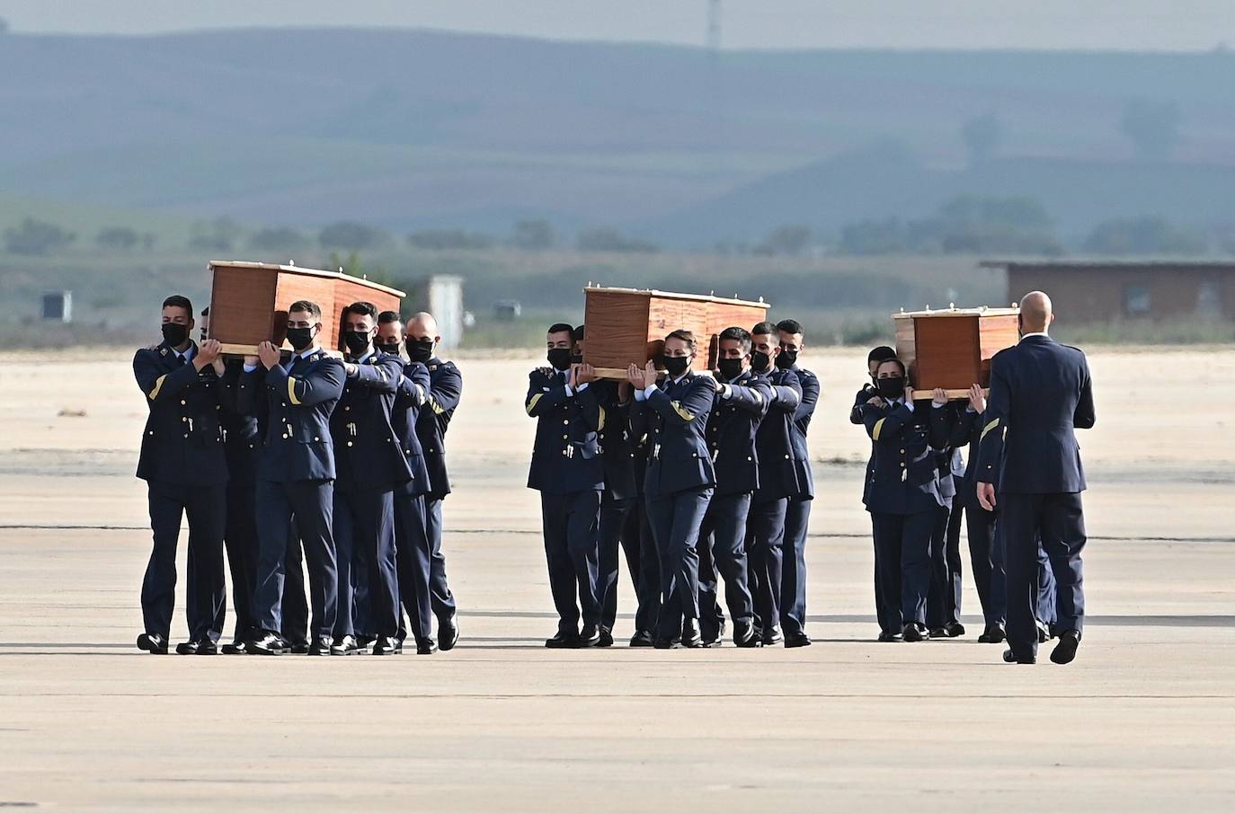 Bodies of Spanish journalists killed in Burkina Faso are flown home