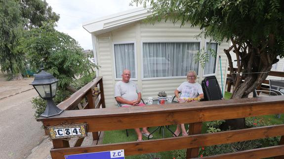 A British couple enjoy staying for several months a year on a campsite on the Costa del Sol. 