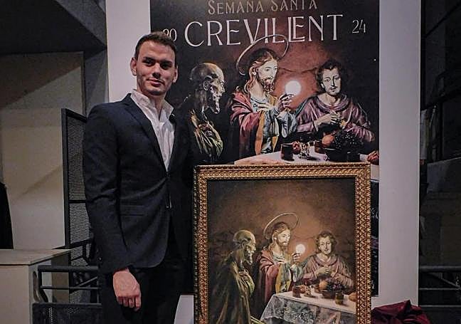 El autor junto a su obra.