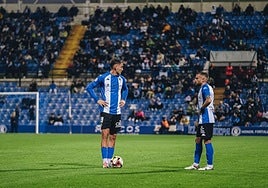 Mangada y Artiles, en un partido de la primera vuelta.