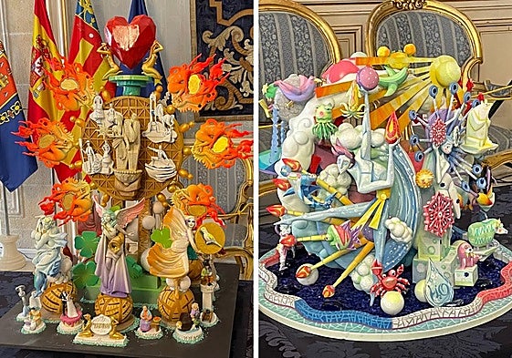 Los artistas de las hogueras oficiales junto a las maquetas.
