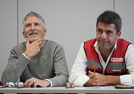 El ministro del Interior, Fernando Grande-Marlaska (i), y el presidente de la Generalitat valenciana, Carlos Mazón (d), durante la reunión del Centro de Coordinación Operativo Integrado (CECOPI) de la Comunitat Valenciana.
