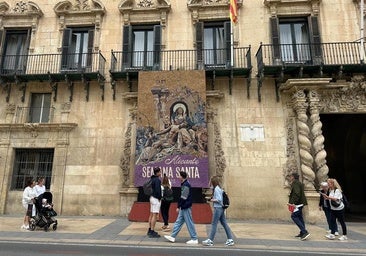 The Town Hall facade is adorned with the tapestries of Alicante's Holy Week