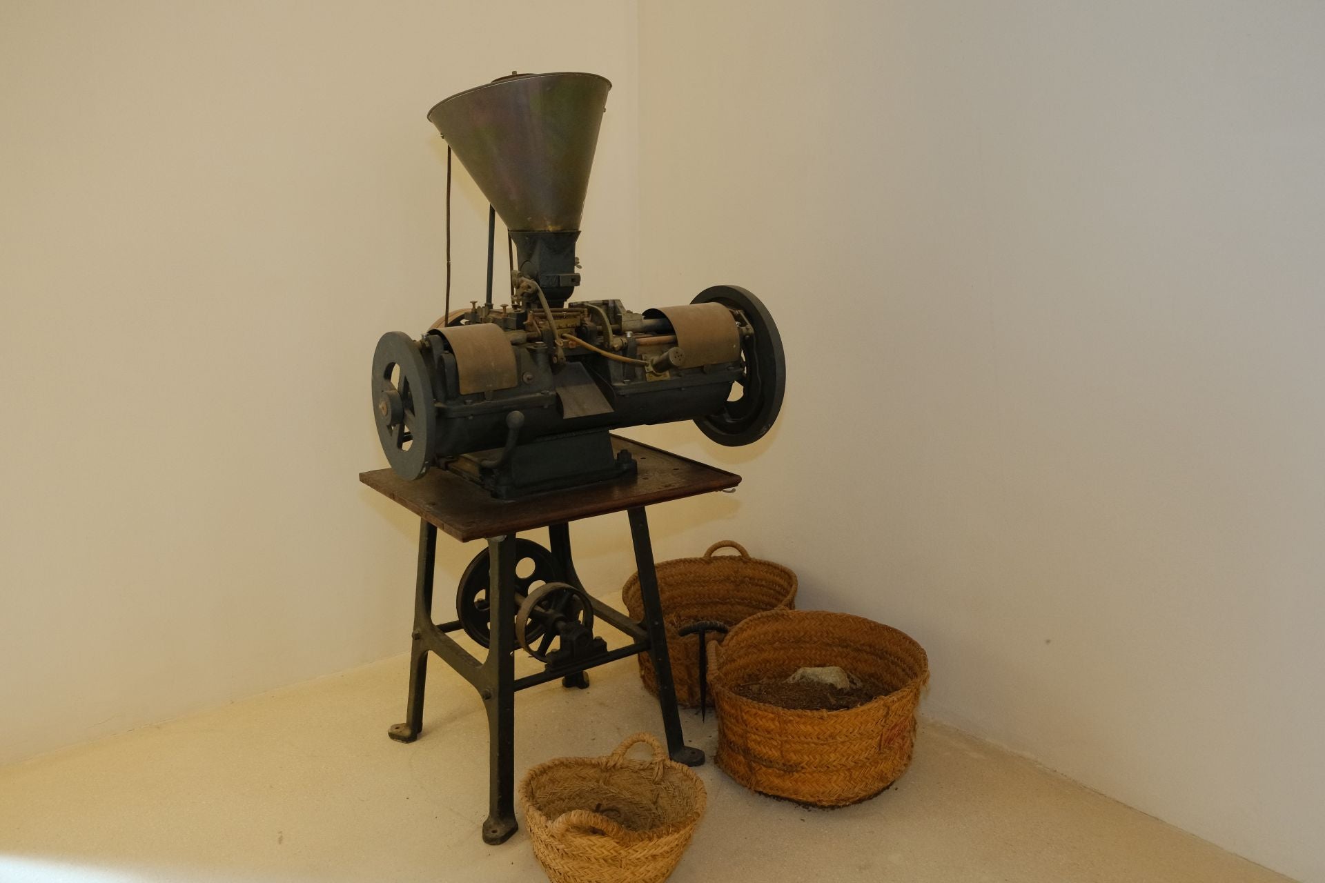 A cigarette rolling machine rescued from the old factory.