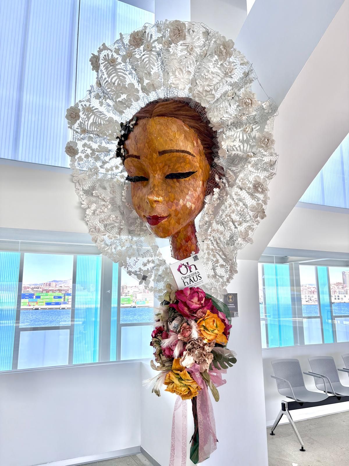 Floral bust of the 'bellea del foc' installed at the new cruise terminal.