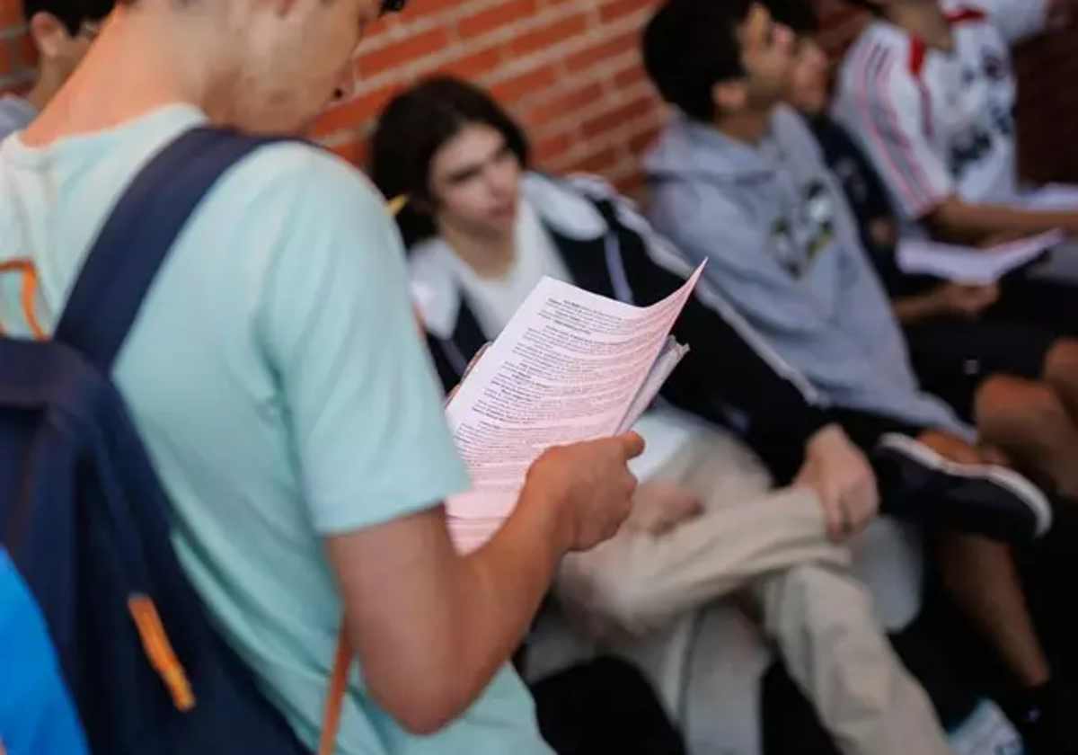 A student reviews their notes before an exam.