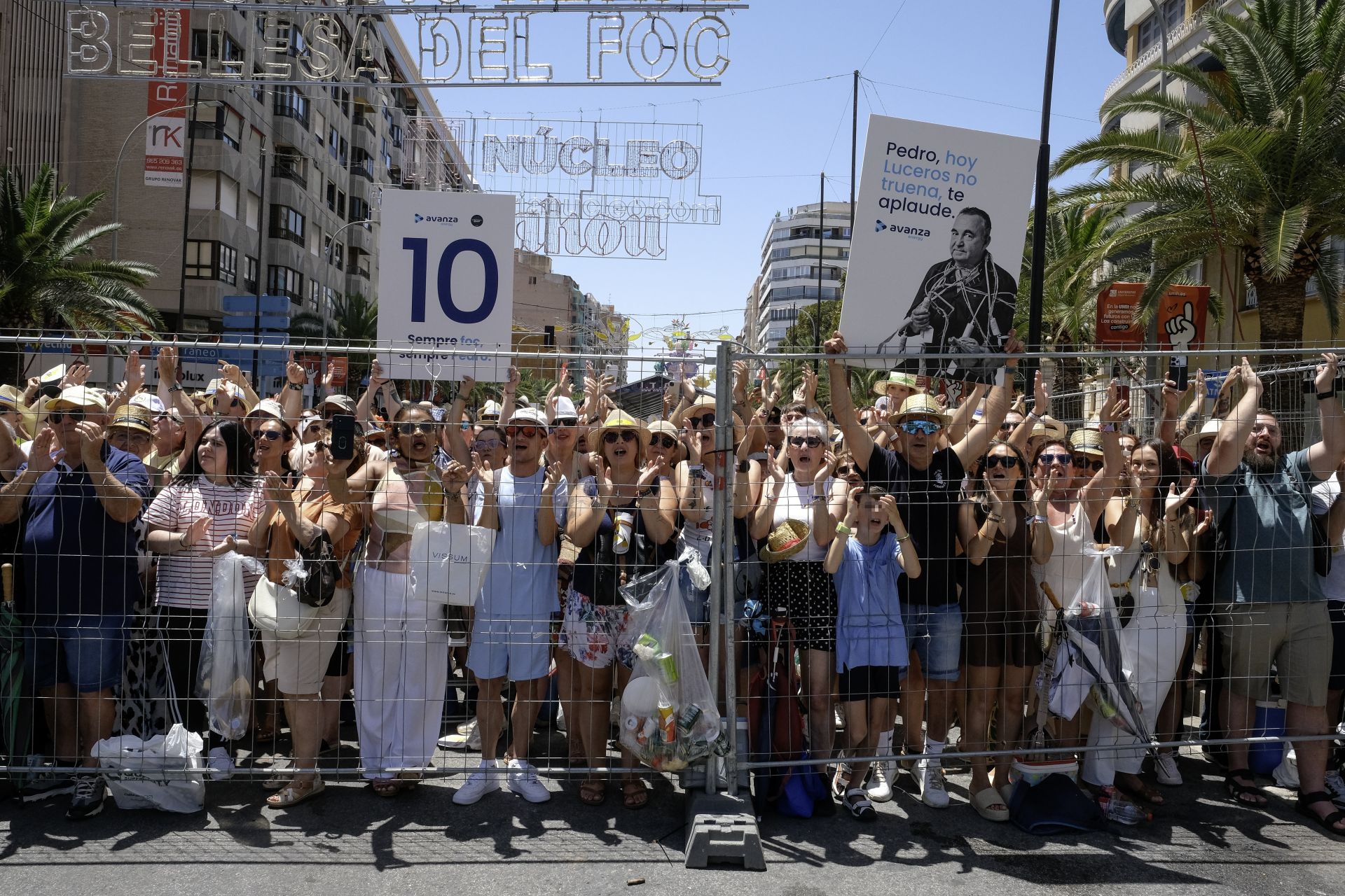 People enjoy a Mascletà in Luceros.
