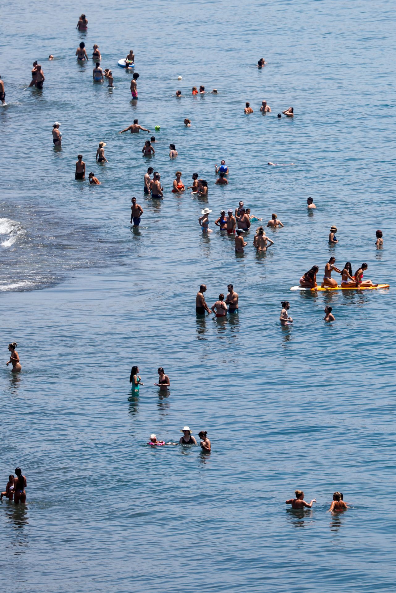 Beachgoers during the heatwave.