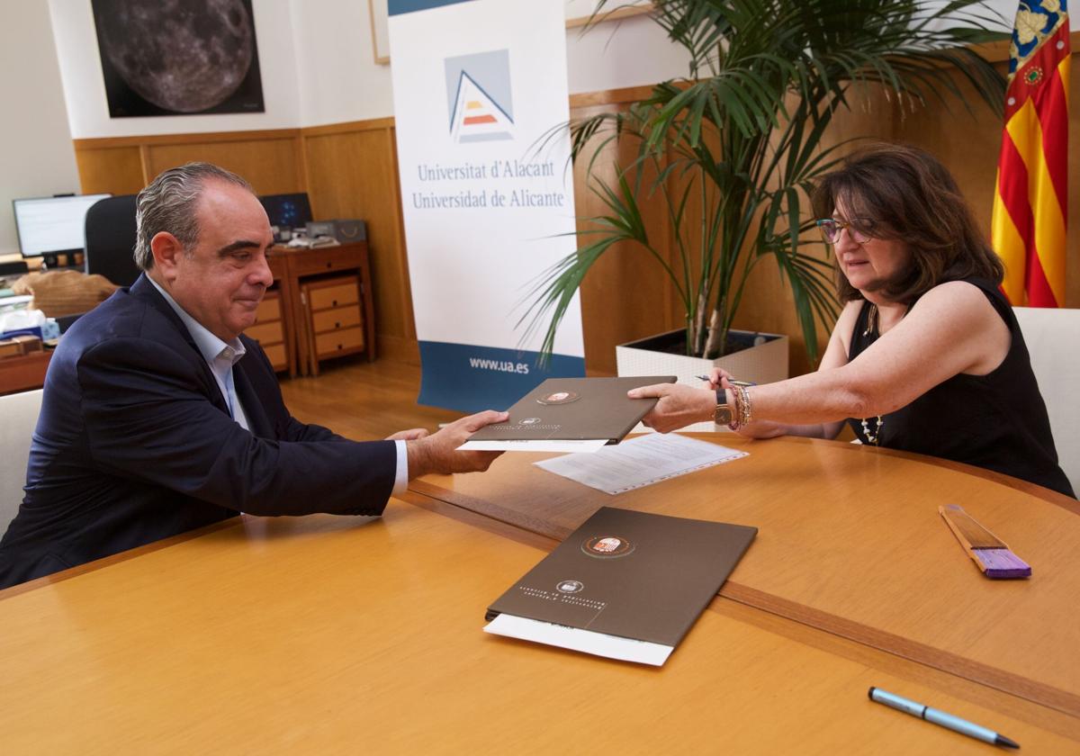Representatives exchange the document