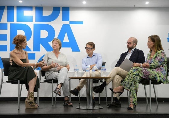 Los ponentes en un momento del debate.