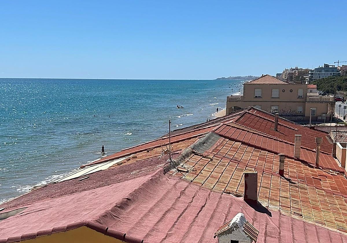 Imagen de las casas tradicionales de la playa Babilonia.