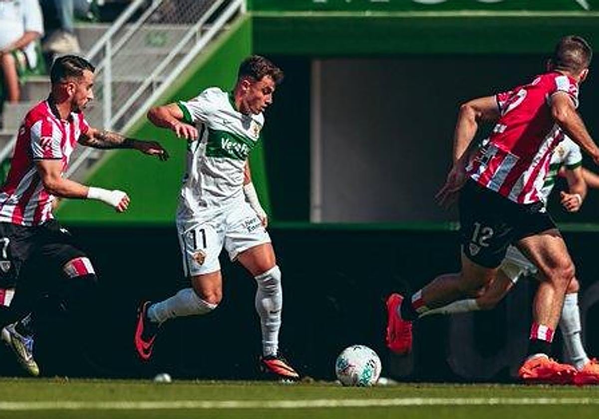 Germán Valera contesting a ball in the first half.