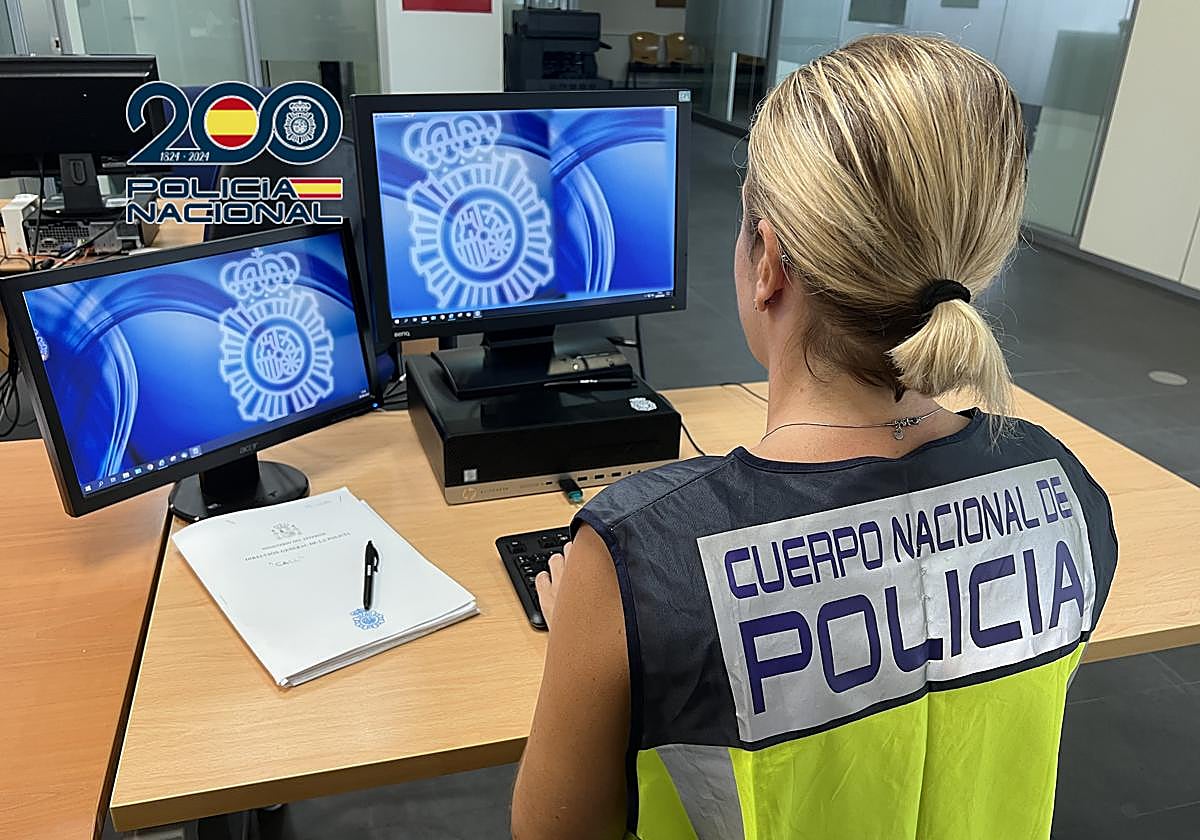 File image of a police officer during their duties at the station.