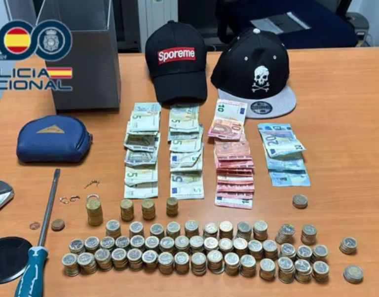Objects and money seized during the police operation.
