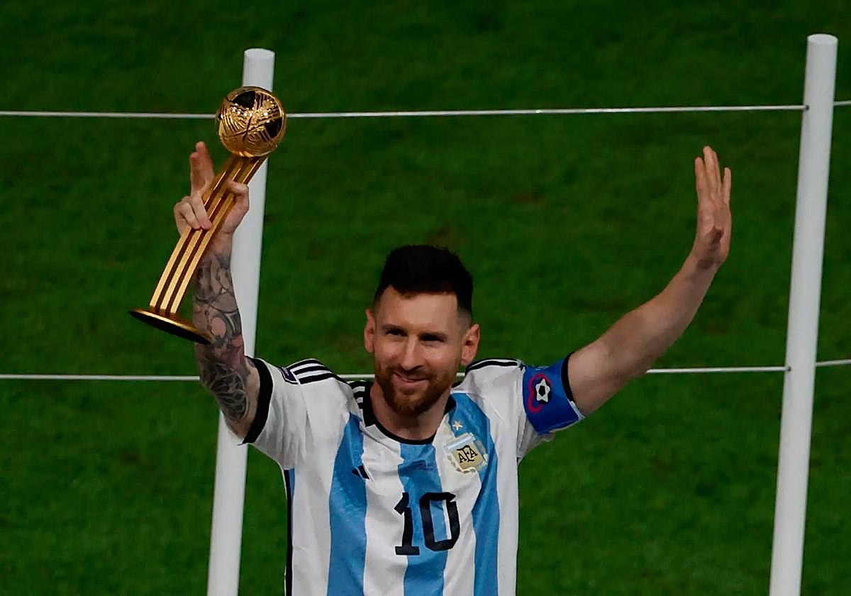 Lionel Messi celebrates victory in the Qatar 2022 World Cup final.