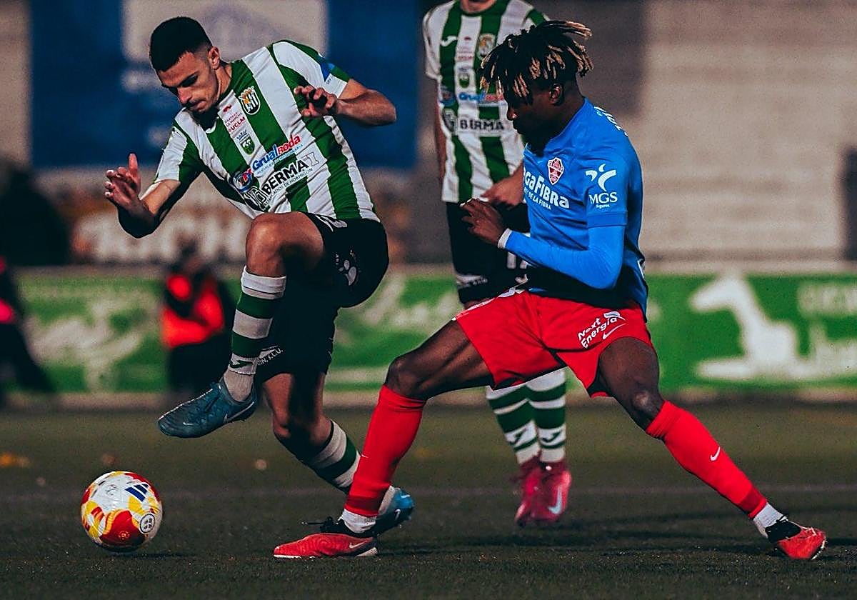 John contests a loose ball during the first half in San Marcos.